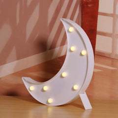 Pooqla Moon marquee table display adds charm to mantle or shelf.