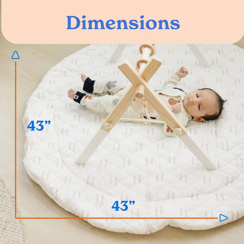 Poppyseed Play tummy-time cushion provides soft support on hard floors