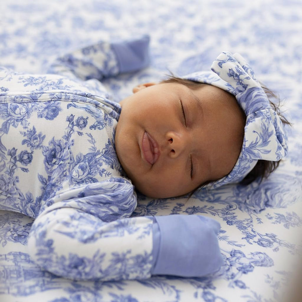 Posh Peanut newborn mittens fold-over feature keeps tiny hands warm.