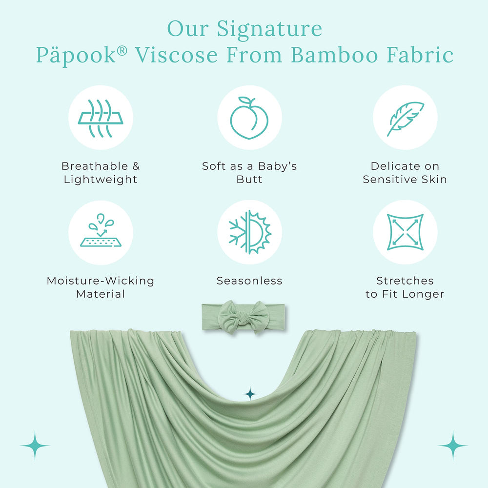Posh Peanut Sage baby sleeping swaddle in nursery shows breathable fabric and room to grow.