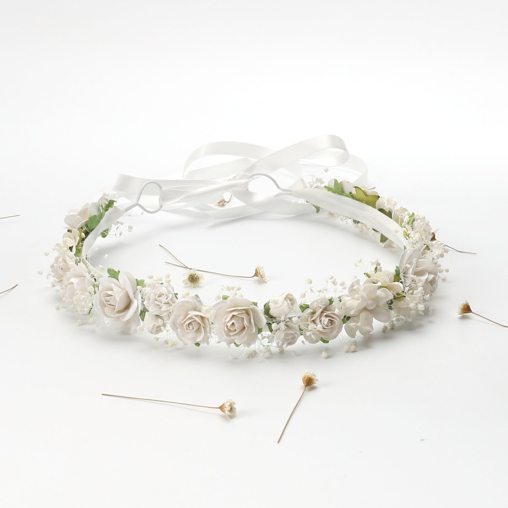 PoshMyra flower crown used as wedding photo prop with rustic charm.