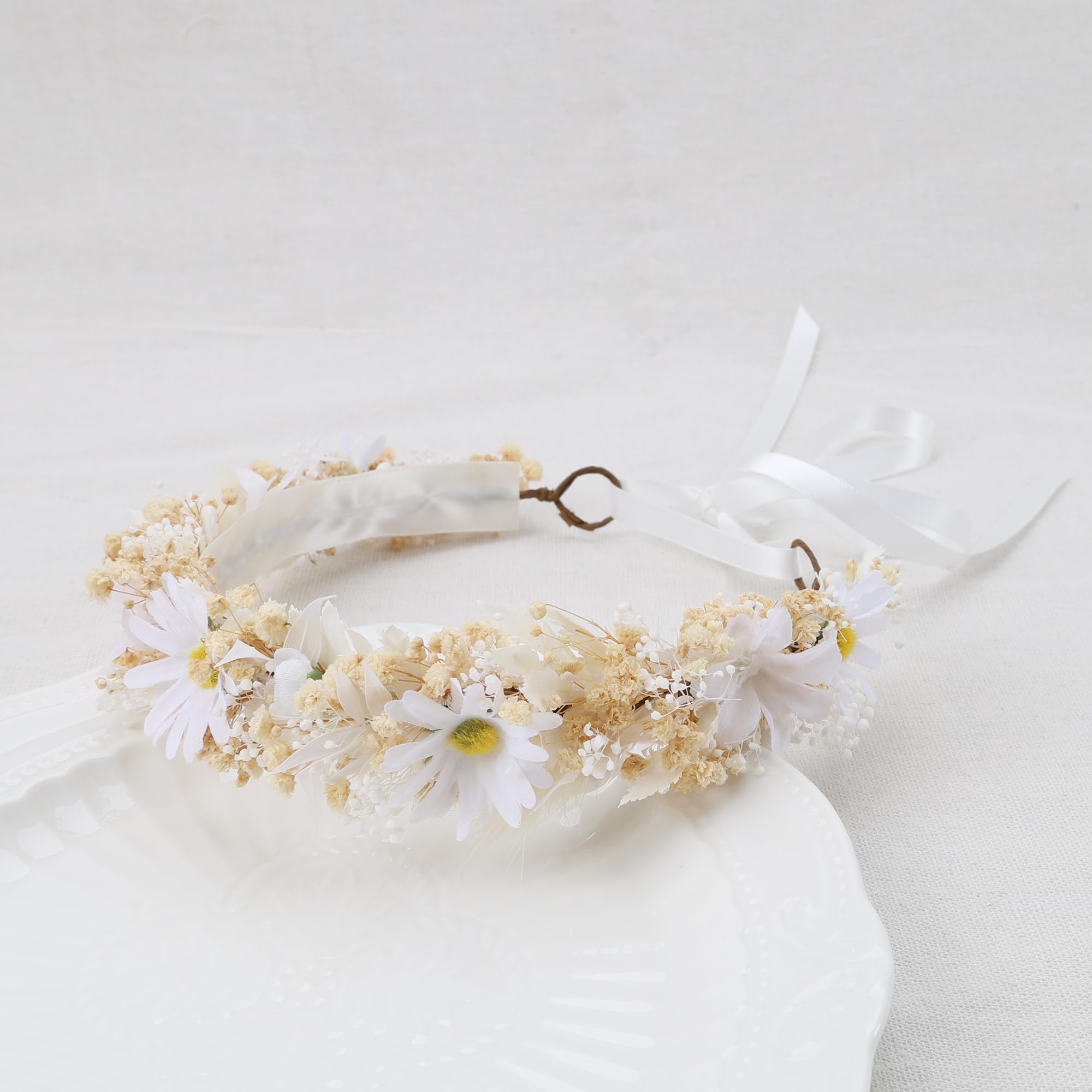 PoshMyra wildflower head garland adds natural charm to family portraits.