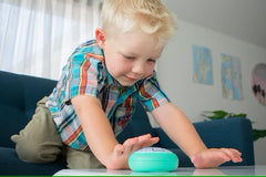 Potty Pause Aqua night light glows softly for nighttime potty cues