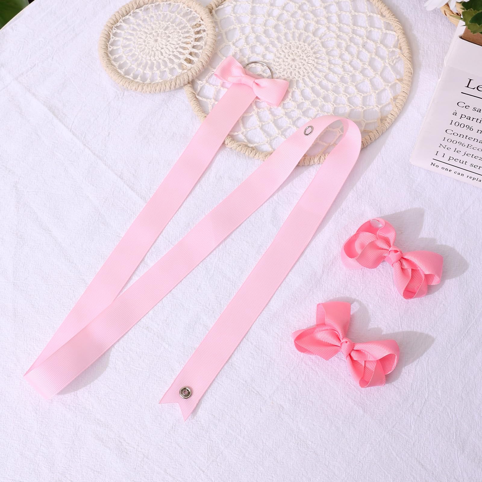 POVETIRE baby hair accessory display keeps bows and clips in view during dress-up.