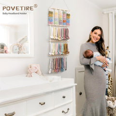 POVETIRE baby bow organizer closeup highlights durable canvas and secure hangers
