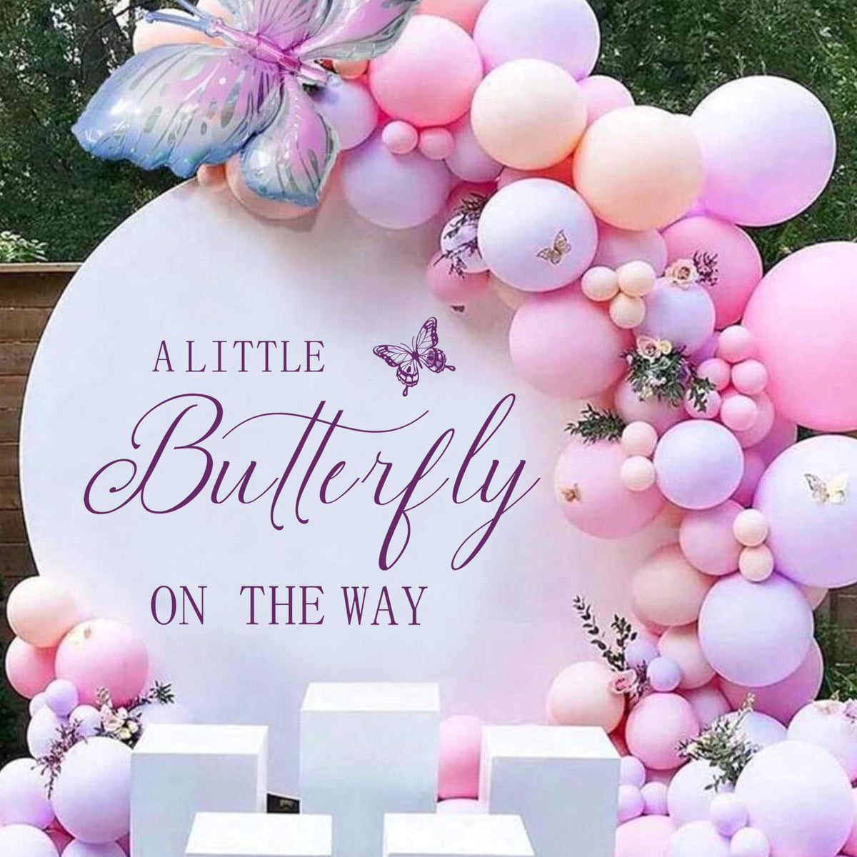 PQQIEE Butterfly Decal arch-backdrop adds whimsical charm to baby showers and photos.