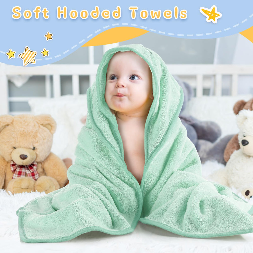 Preboun hooded towel secures head warmth as babies move during drying