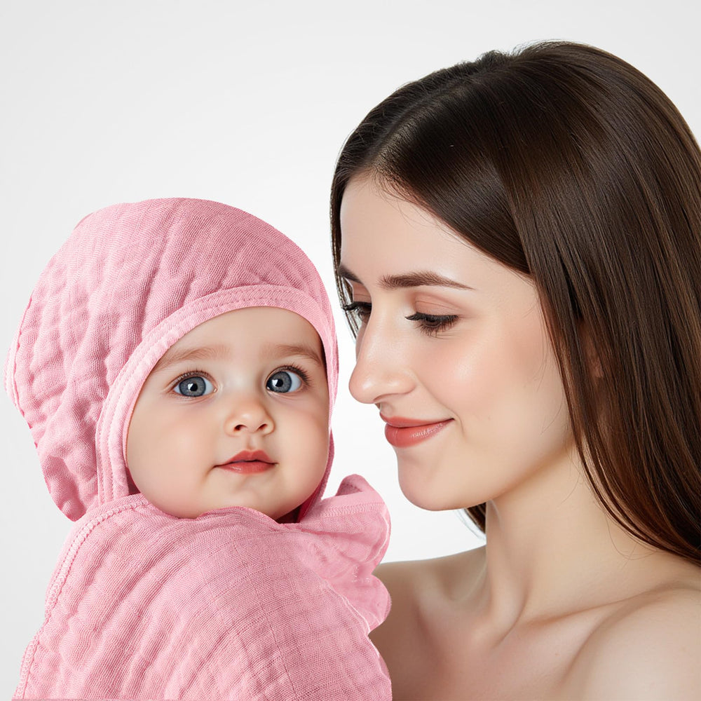Preboun hooded towel doubles as swaddle or mat cover