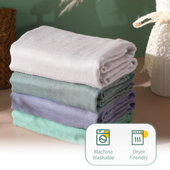 Preboun towel showing swaddle-like versatility for cuddles after bath