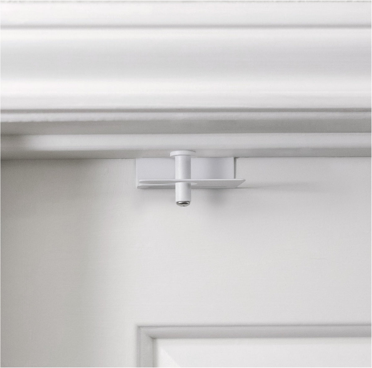 Predictable Solutions GlideLok top lock on interior door demonstrates child safety.