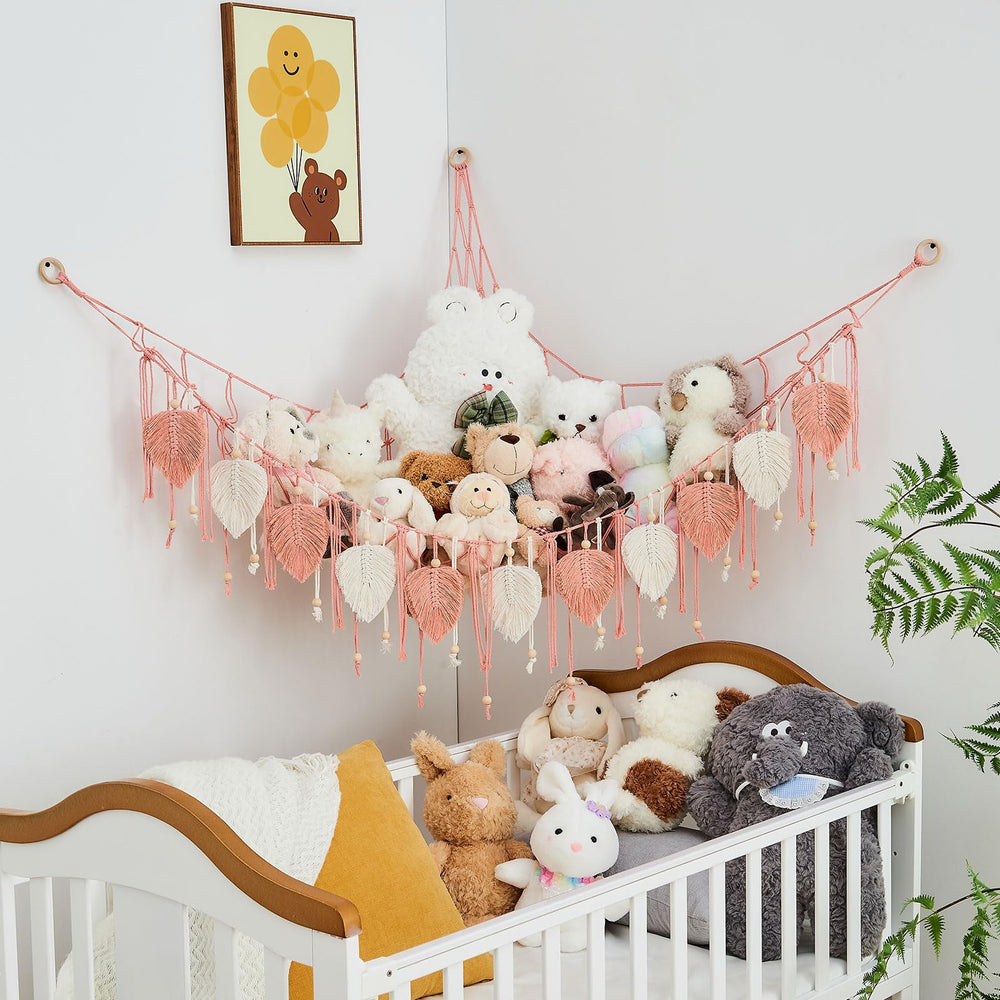 Pretty Jolly macrame boho nursery decor elevates room style while organizing toys.