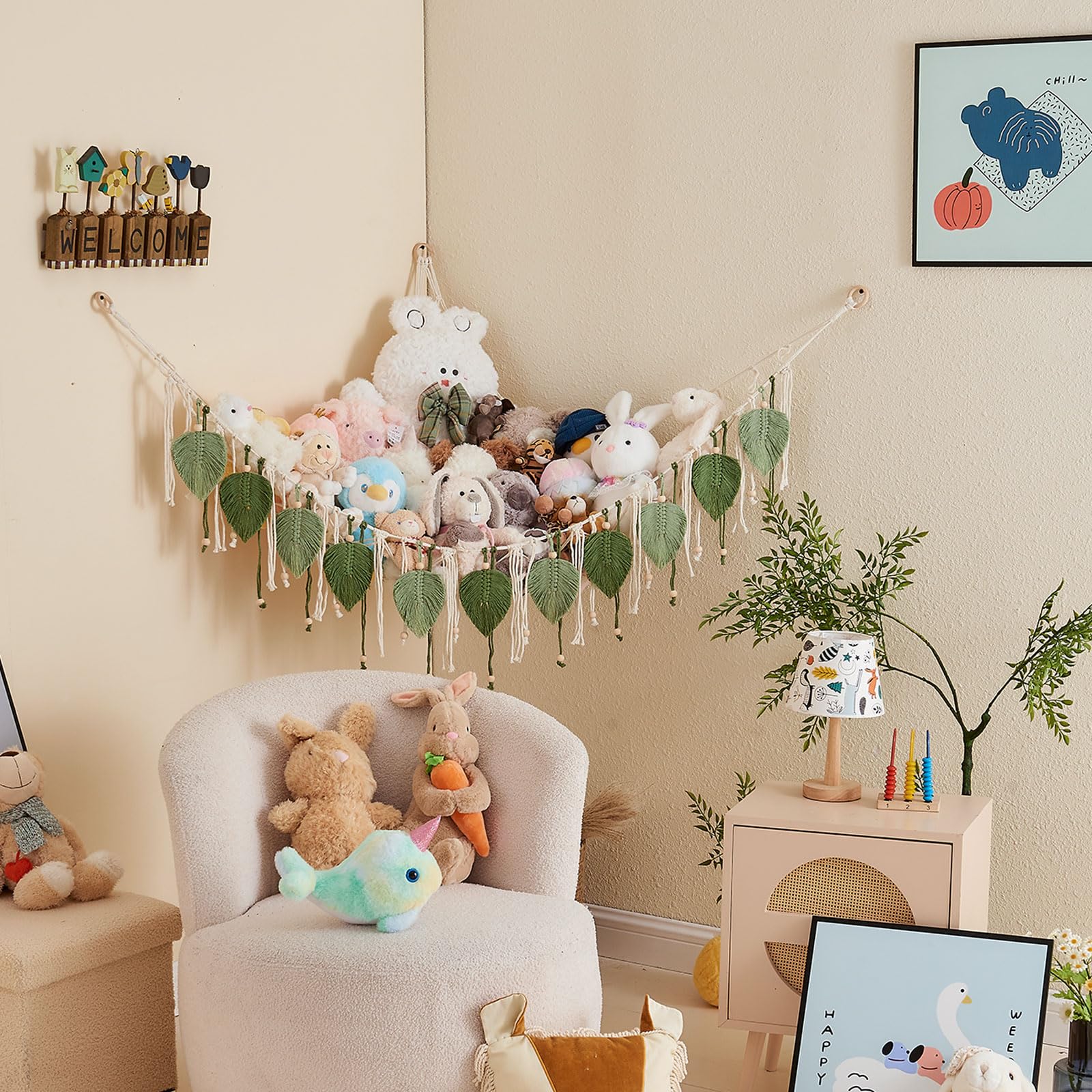 Pretty Jolly macrame hammock in a kids room highlighting plush toy capacity.
