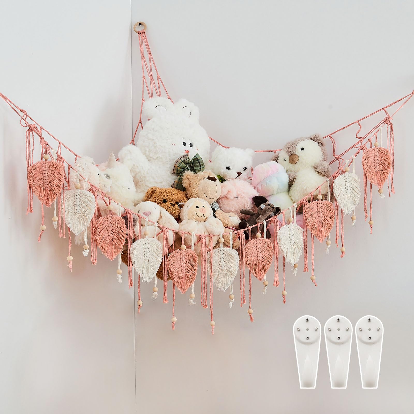 Pretty Jolly macrame stuffed animal hammock beads highlights organized toy display and decorative charm.