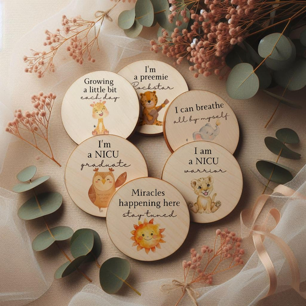 Prezzeluna wooden NICU signs close-up highlighting keepsakes marking small victories.
