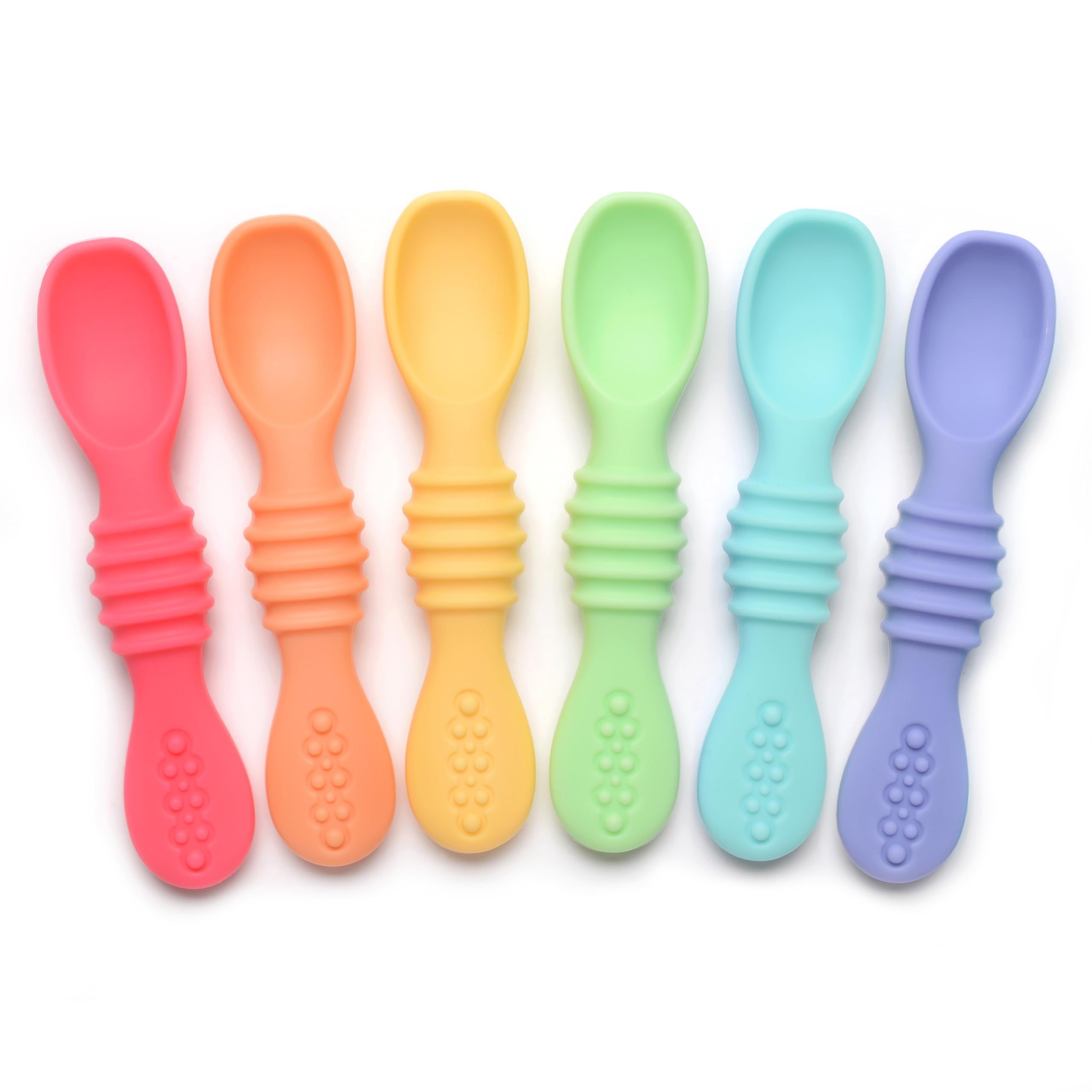 PrimaStella Summer Rainbow chew spoon in use, helping baby practice self-feeding with a safe grip.
