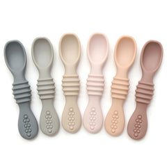 PrimaStella silicone chew spoon set with dual ends supports self-feeding and teething exploration.