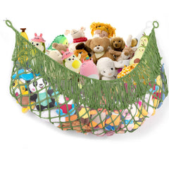 PrimZooty stuffed animal hammock in avocado green hanging on wall to reduce clutter.