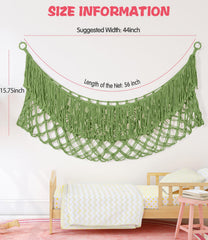 PrimZooty avocado green hammock installed above crib for quick storage.