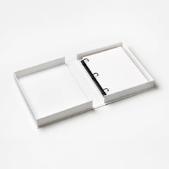 PrintWorks Dream Big Little One beige album open for milestone photos and stories.