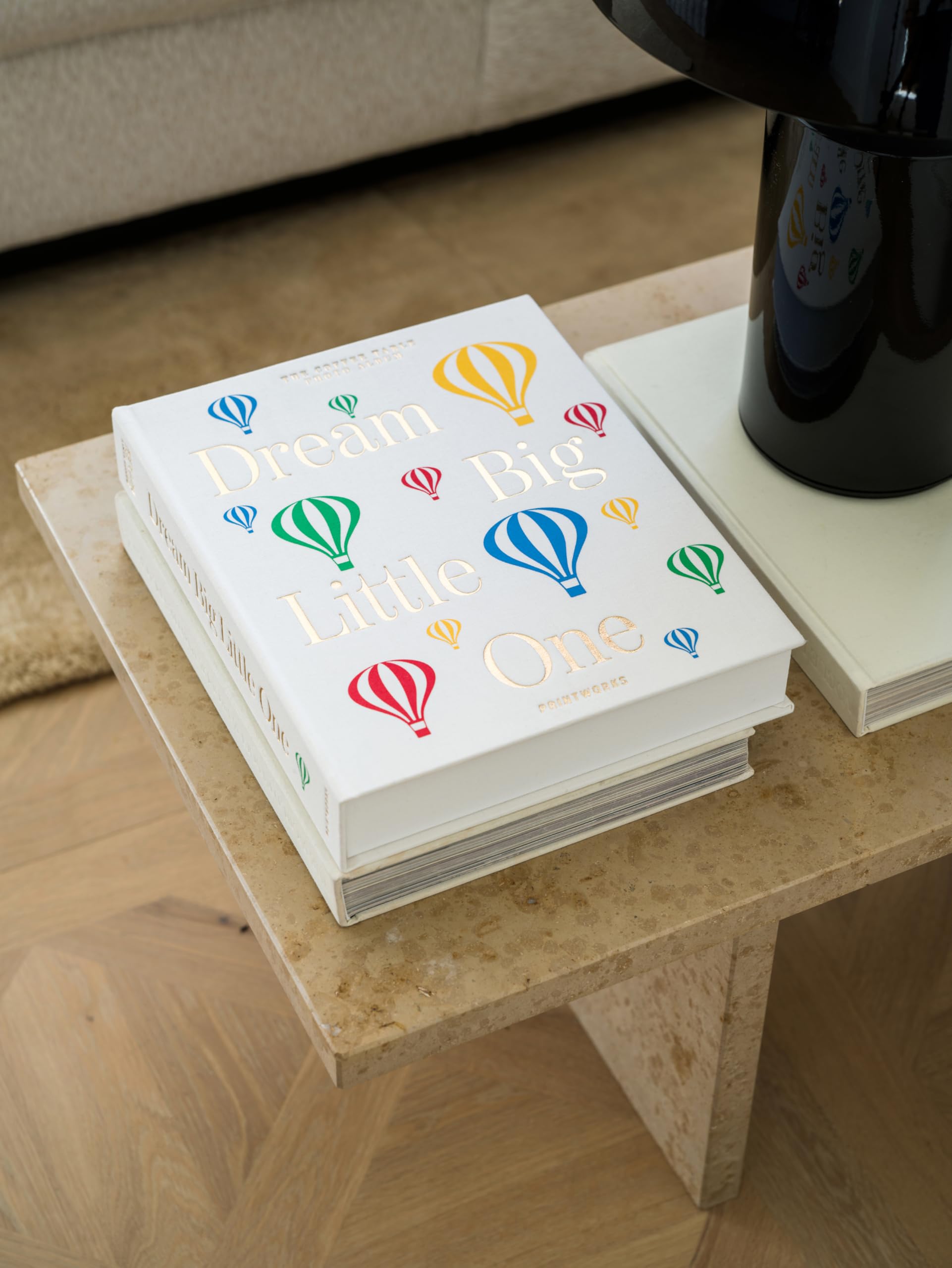 PrintWorks Dream Big Little One beige baby-photos layout supports organized memories.