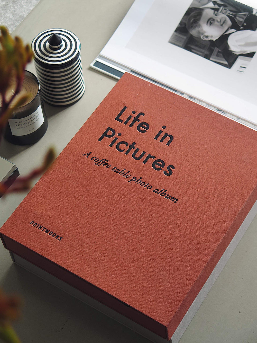 PrintWorks Life in Pictures weighted black paper enhances photo contrast and a premium feel.