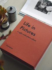PrintWorks Life in Pictures weighted black paper enhances photo contrast and a premium feel.