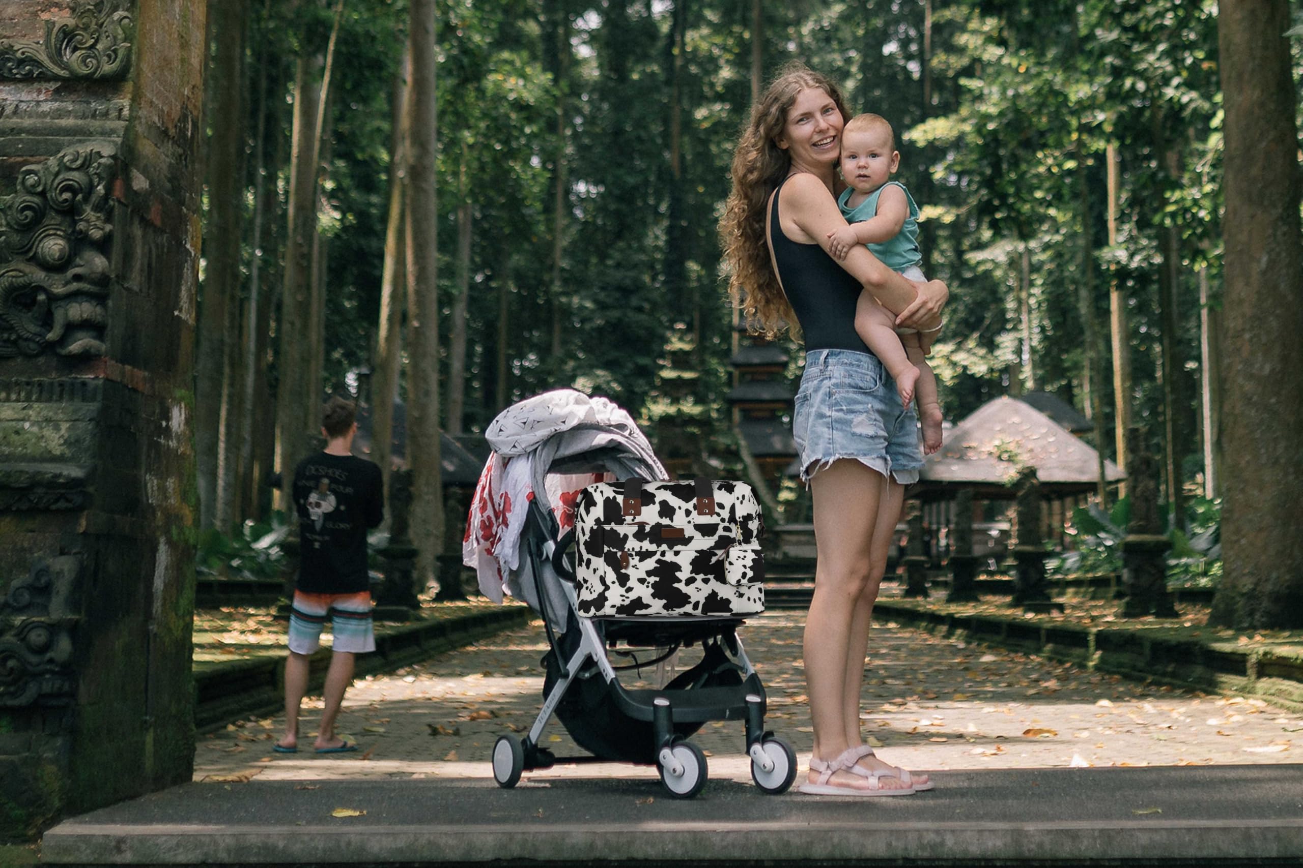 Pritent diaper bag tote luggage sleeve adds convenient travel compatibility.