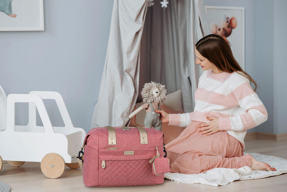 Pritent Diaper Tote includes adjustable strap and stroller clips for hands-free carrying.
