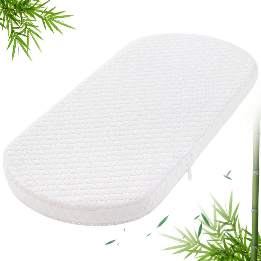 Pro Goleem bassinet pad in a nursery—soft, breathable topper for baby's sleep.