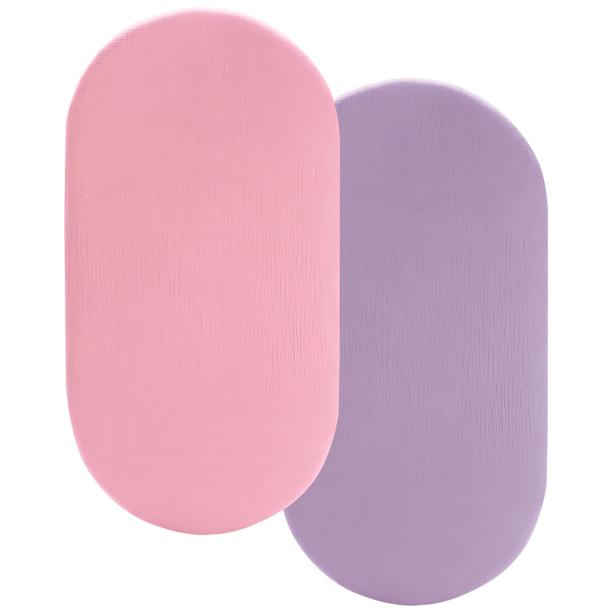 Pro Goleem Muslin Bassinet Sheet pink on bassinet showing gentle fit for delicate skin.