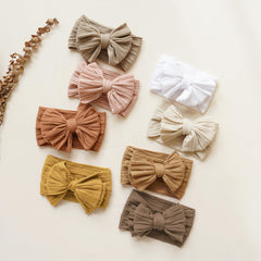 Prohouse baby headbands beige; timeless color for photoshoots and daily use