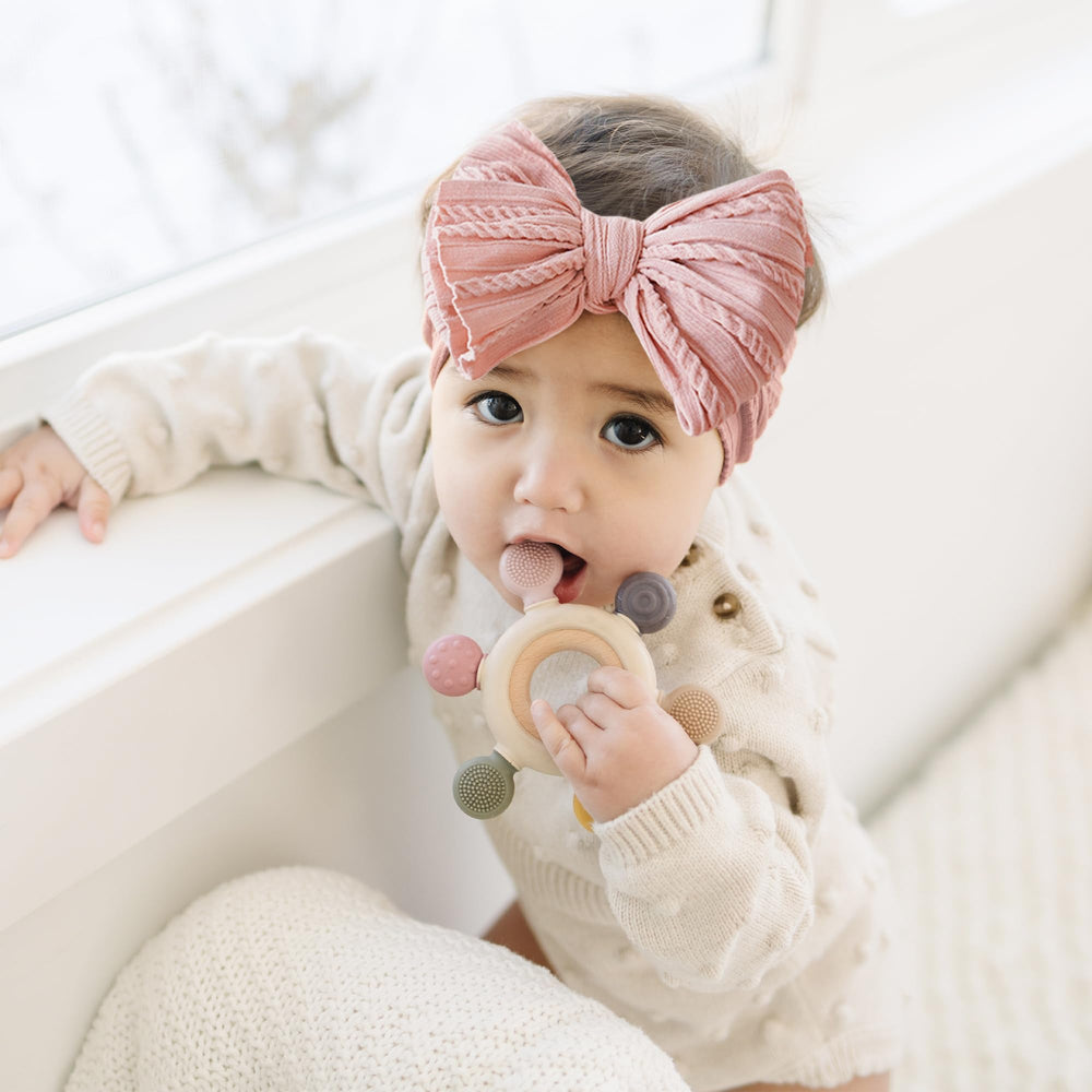 Prohouse baby headbands navy; adds color while staying comfortable through play