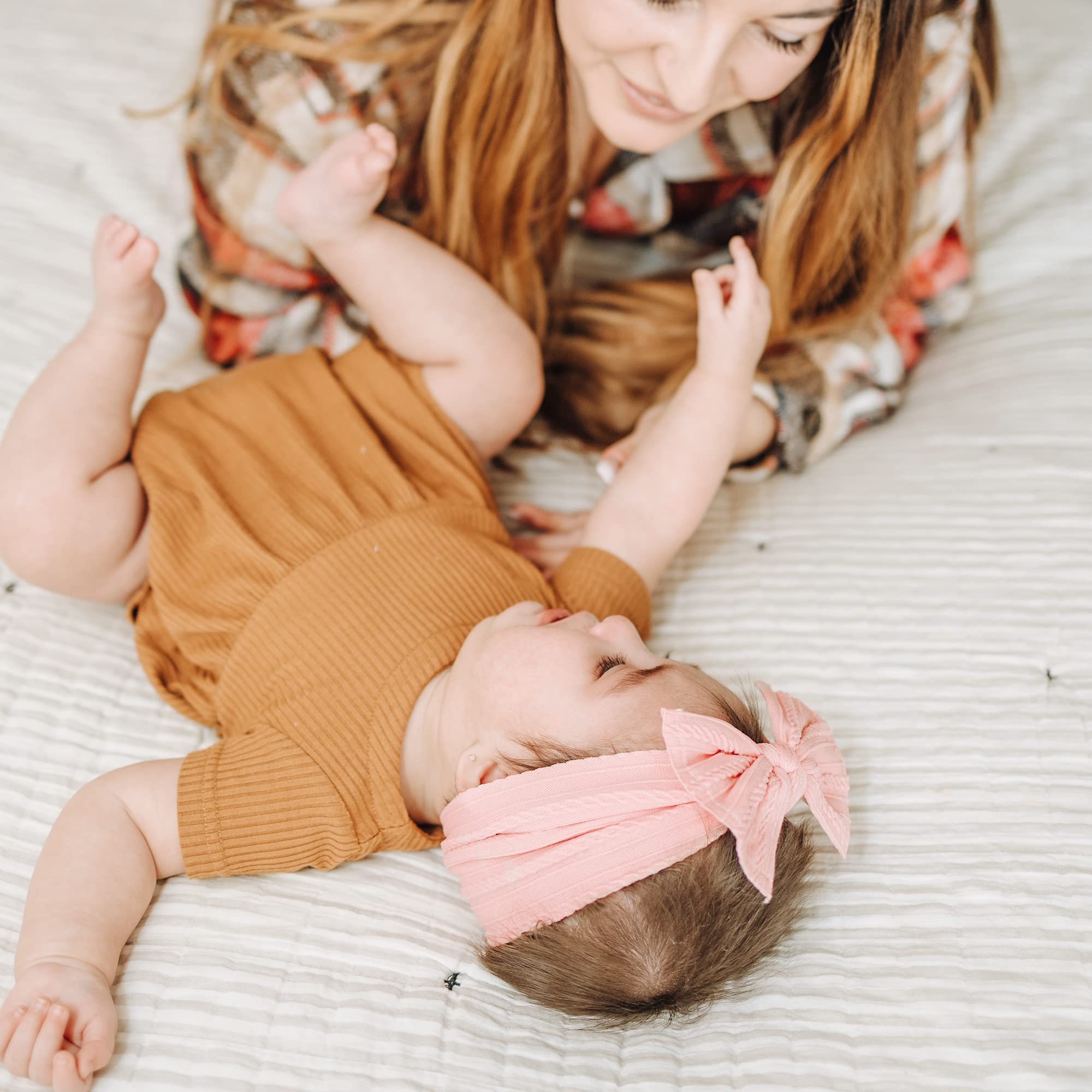 Prohouse headbands styled with baby outfits for photoshoots and everyday wear.