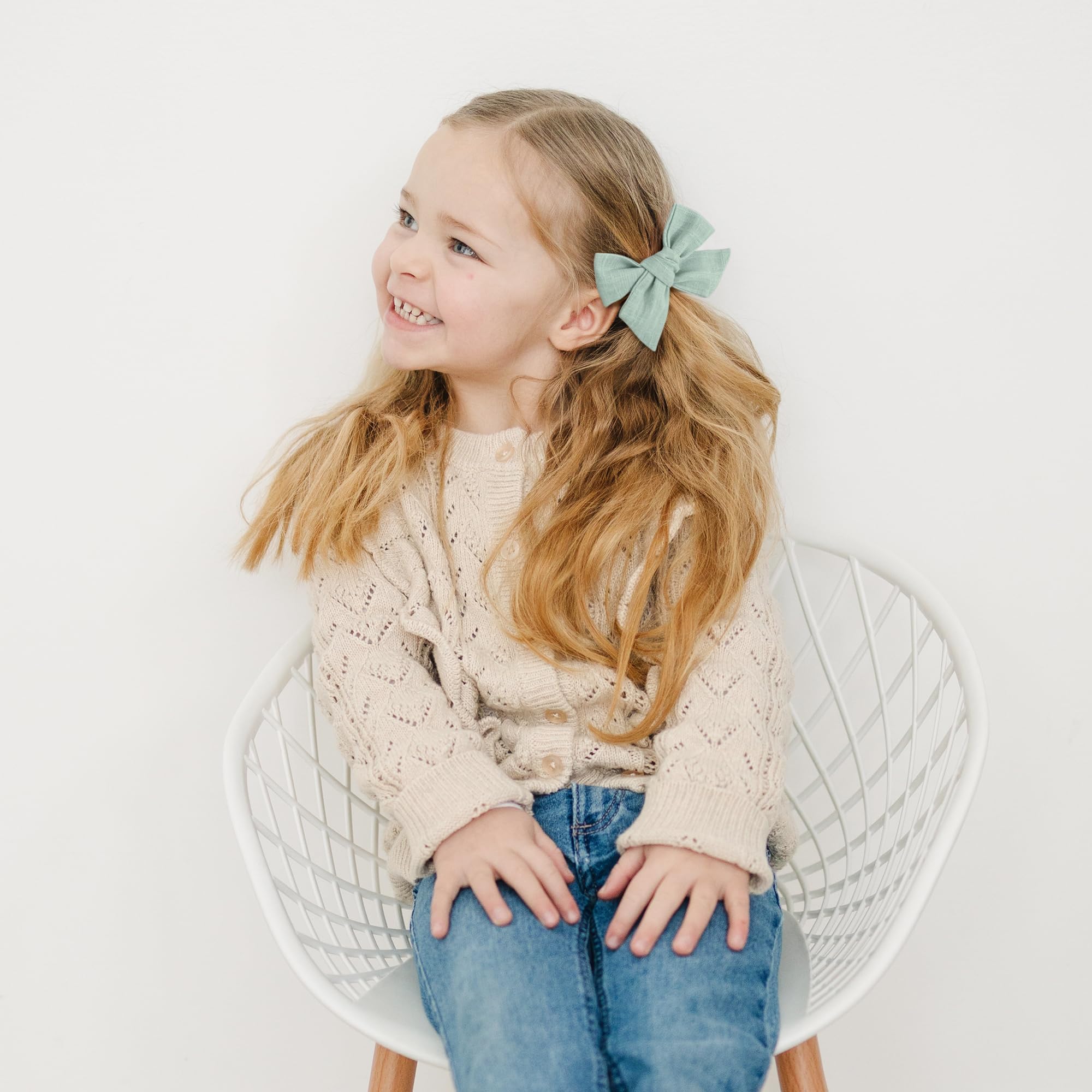 Prohouse baby pigtails bows on head demonstrate toddler styling options.