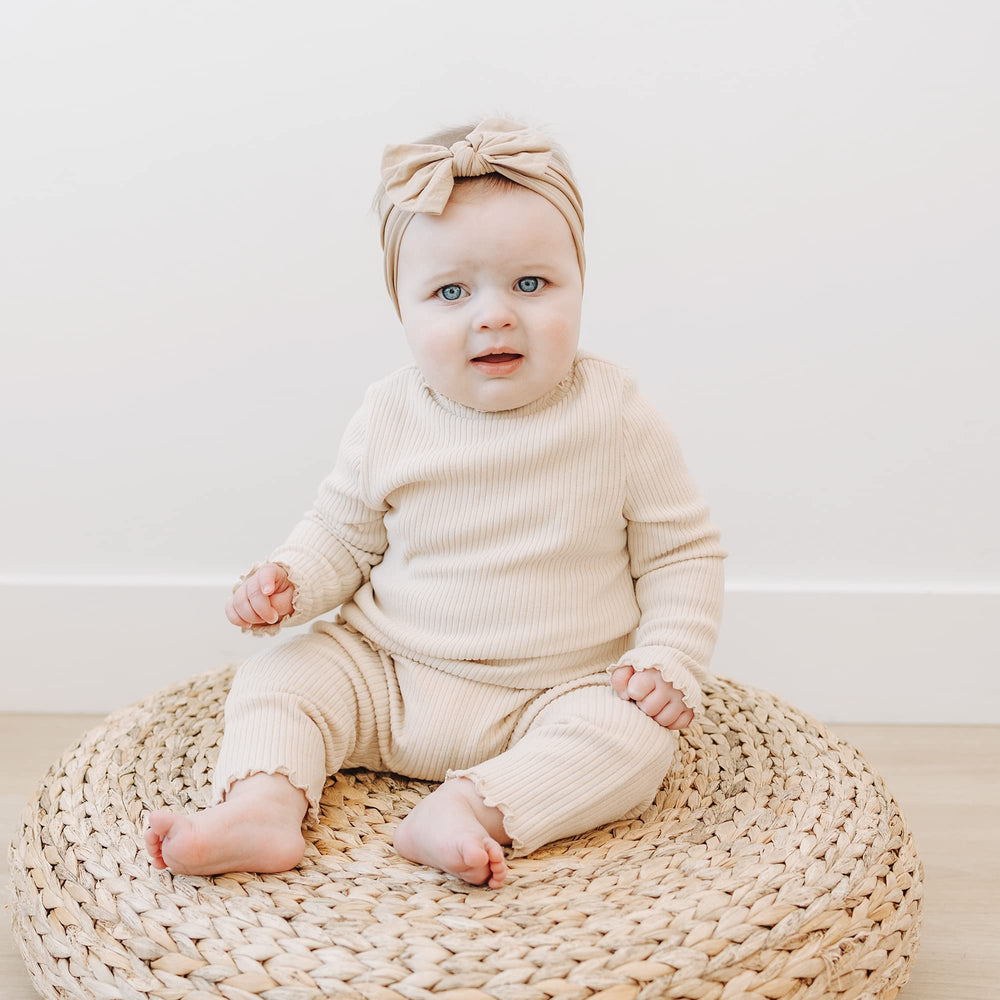Prohouse daily-wear nylon headbands on newborn to toddler in colorful outfits.