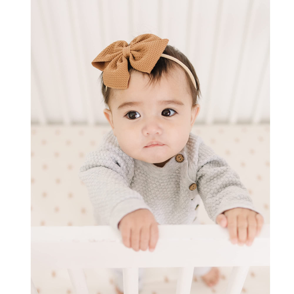 Prohouse no compression marks headbands protect delicate baby skin.