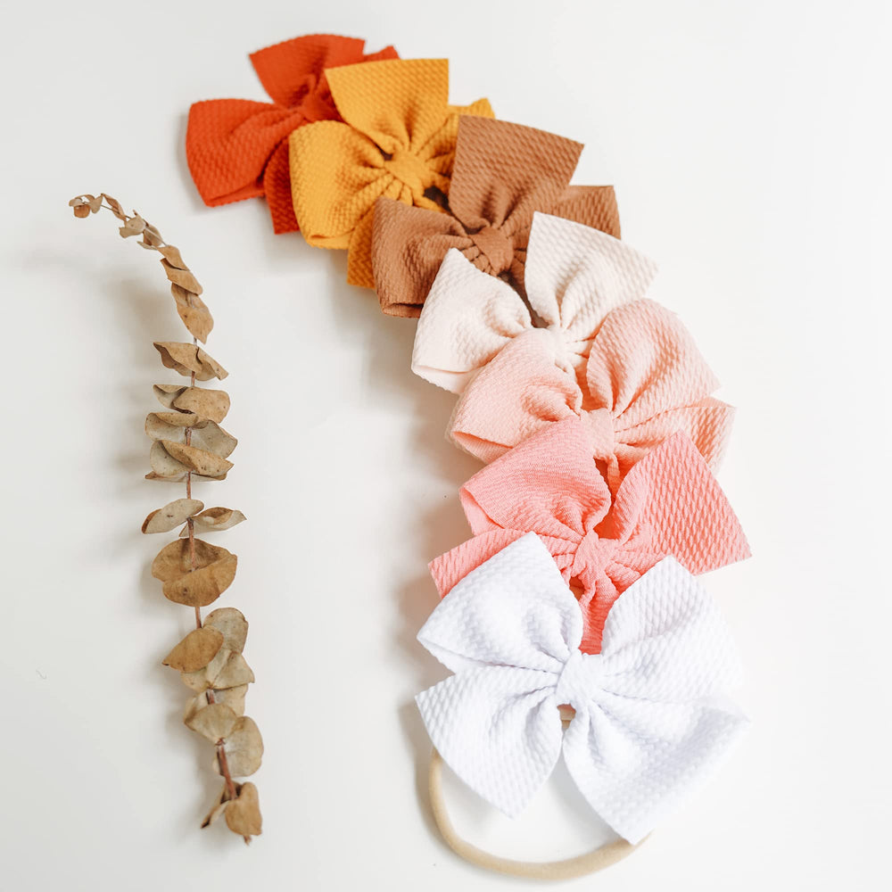 Prohouse one size fits all headbands grow with your child.