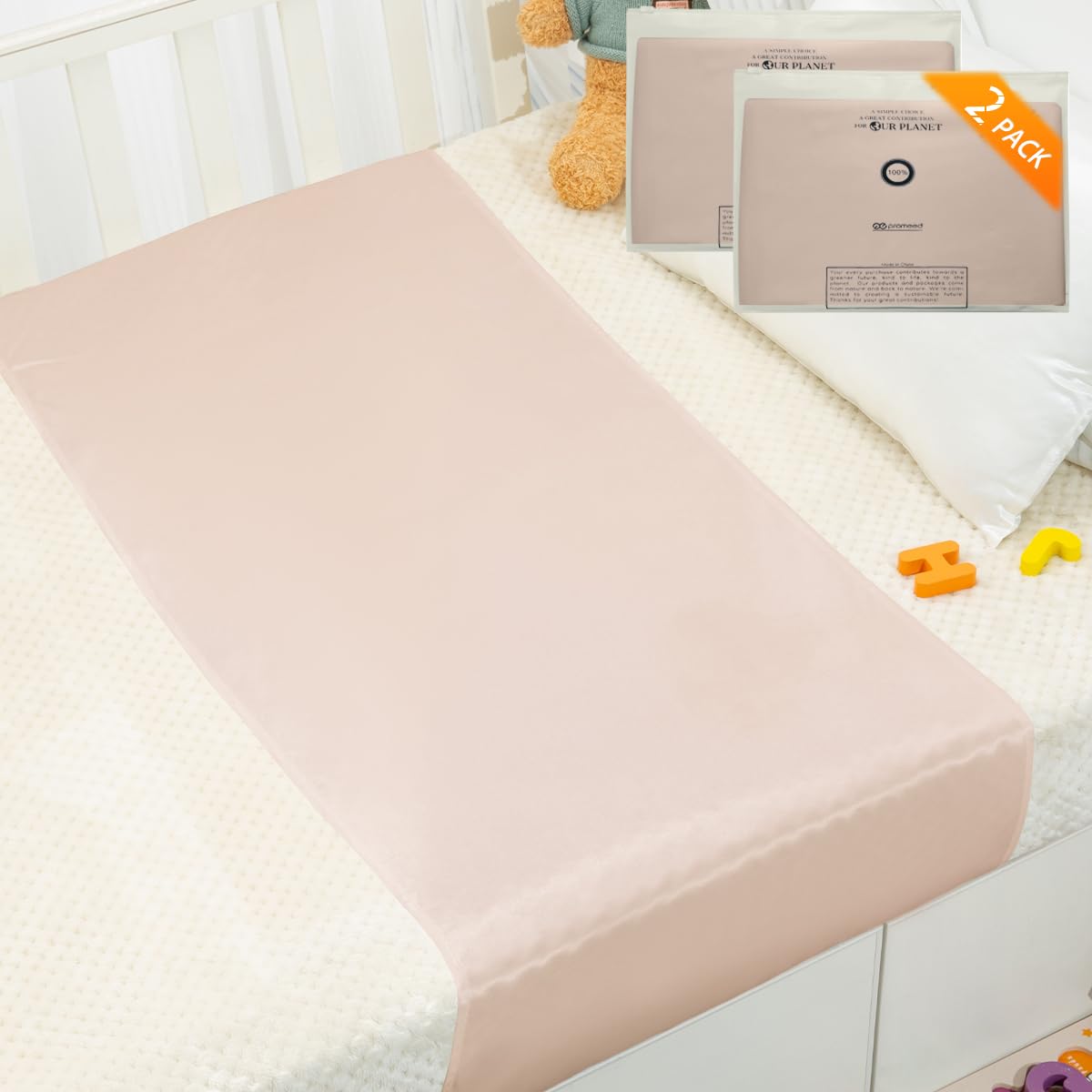 PROMEED silk crib sleeve on mattress showing snug fit and reduced friction for baby comfort