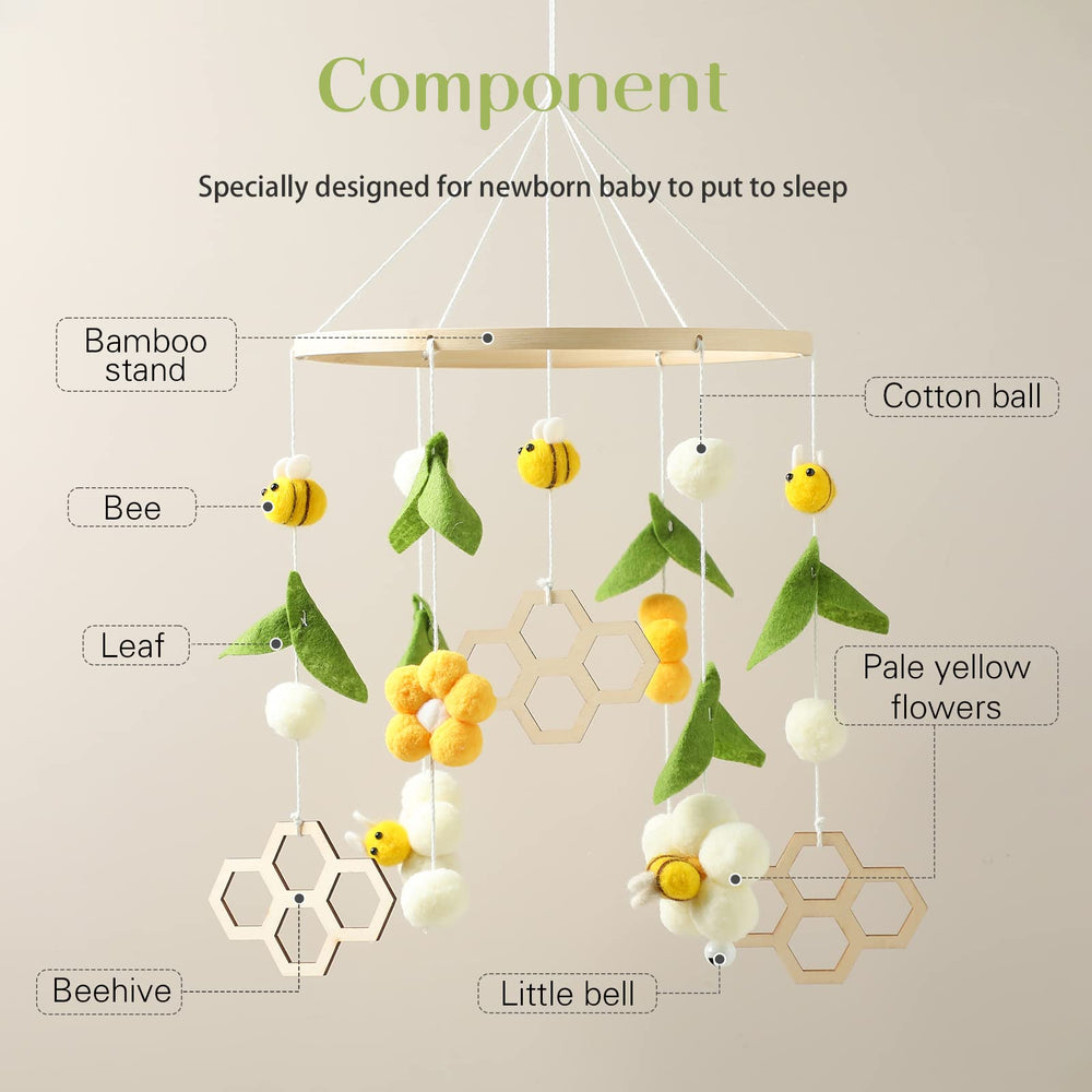 Promise Babe felt ball wooden hoop showcases handmade wool elements for cozy nursery charm.