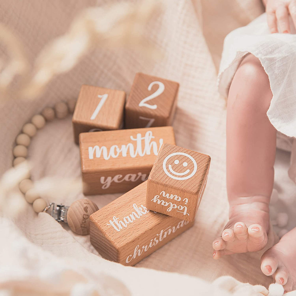 Promise Babe milestone blocks support early numeracy and symbol recognition.