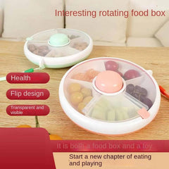 Proudy snack spinner pink rotating button enables interactive, independent snacking
