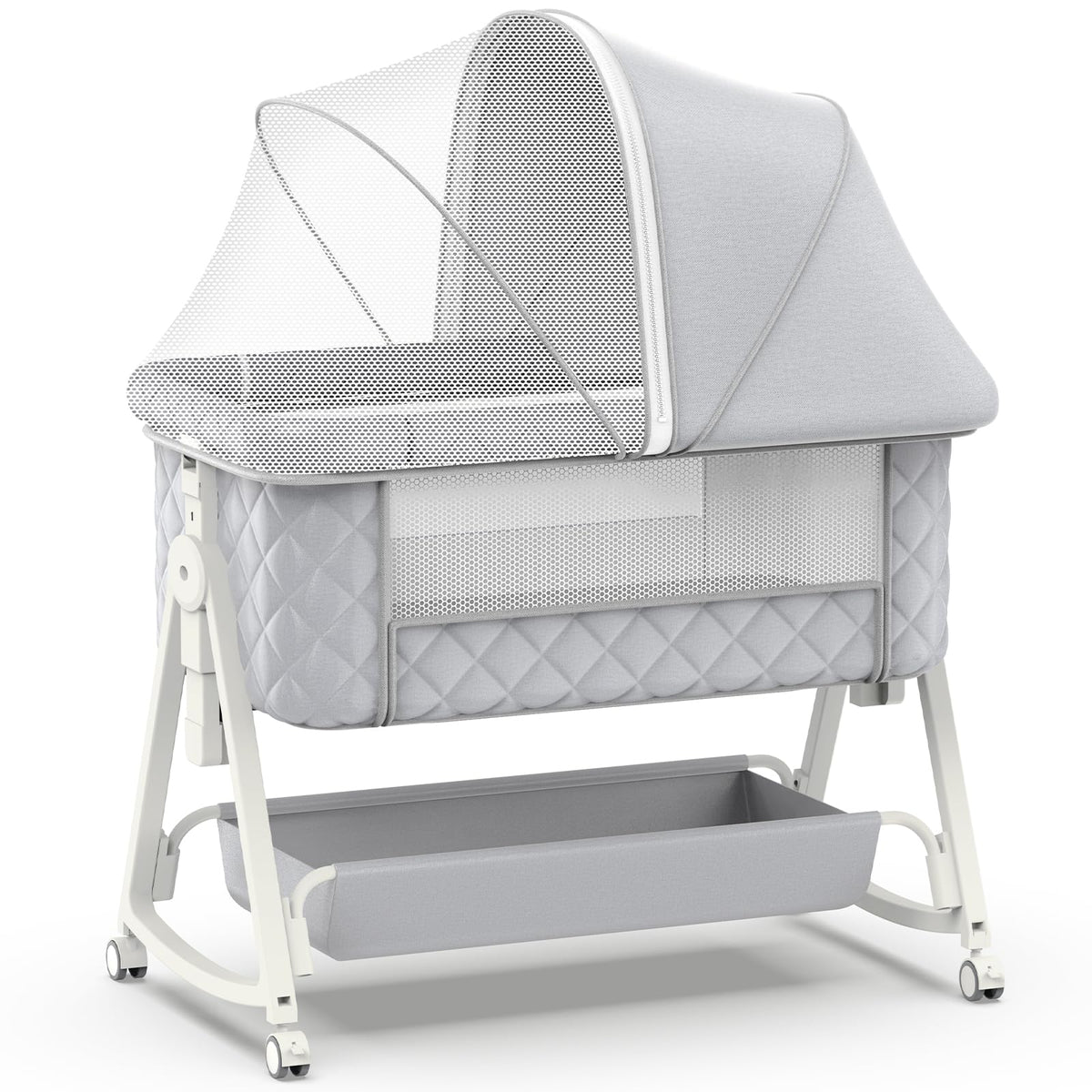Pudult baby bassinet bedside-sleeper beside bed for easy nighttime care.