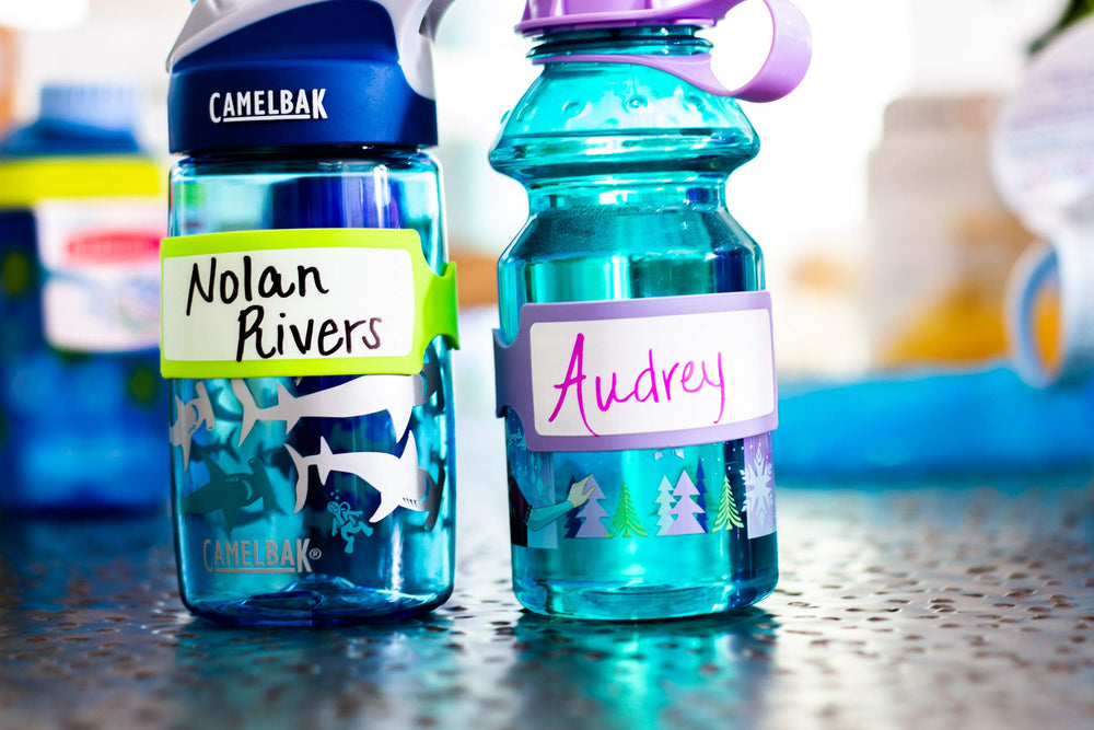 Pumpkin Doodle turquoise labeled bottles used in daycare for organization.