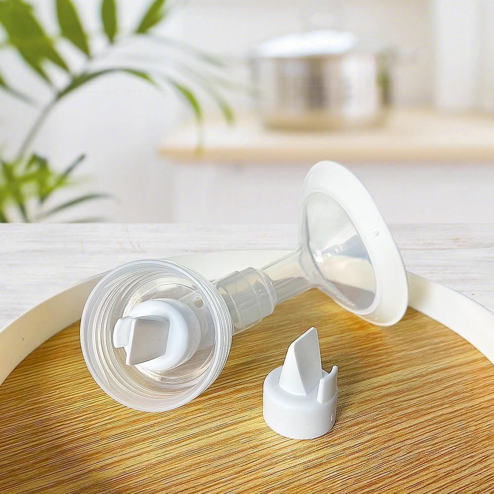 PumpMom-us easy-clean adapter simplifies quick rinsing with bottle brush and soap
