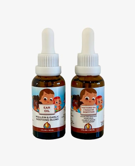 Punkin Butt teething oil bottle closeup showing organic oils for soothing gums