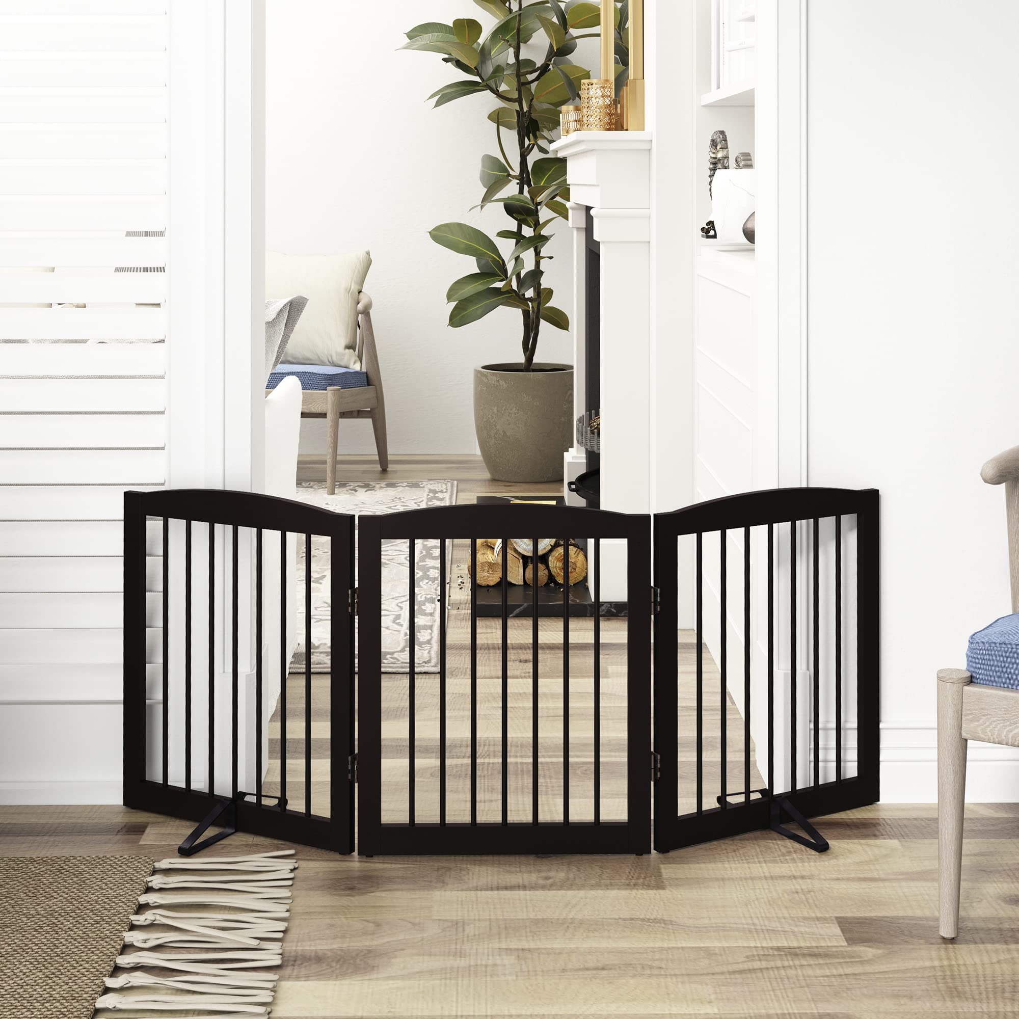 PUPETPO freestanding pet gate unfolded to create a doorway barrier