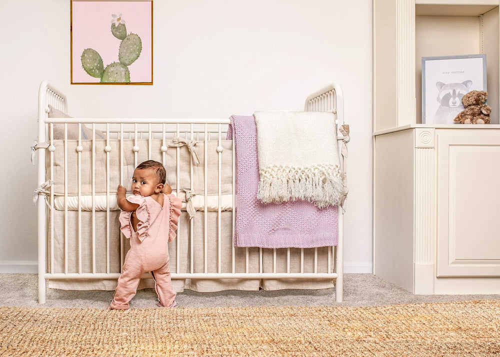 Pure Bamboo crib sheet soft touch creates a cozy sleeping environment for baby.
