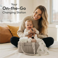 PUTSKA diaper caddy with 6 external pockets keeps diapers and creams accessible.