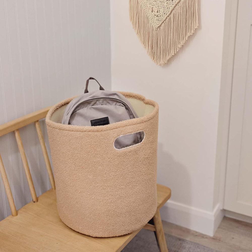PUTSKA basket durable-handles shows easy carrying for nursery or bedroom decluttering.