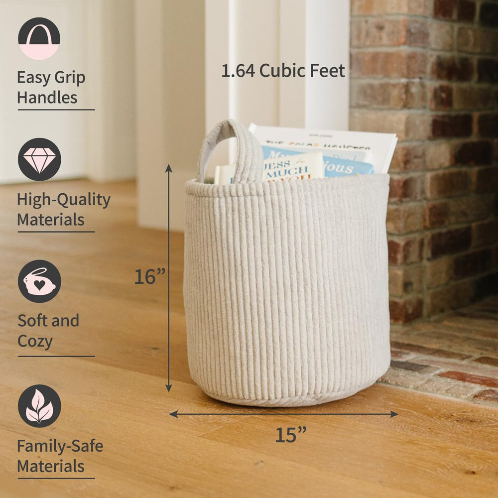 PUTSKA blanket basket round grey open demonstrating easy access for clothes and toys.